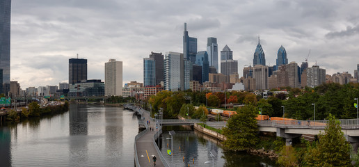 Philadelphia, Pennsylvania, United States - October 28, 2018: Panoramic view of a modern Downtown City during a cloudy day.