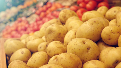 Vegetables for sale. Fresh potatoes on the market.