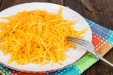 Vegetarian salad of fresh organic pumpkin, raw food