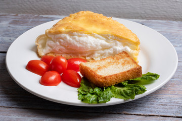 salad and toast with omellete for breakfast