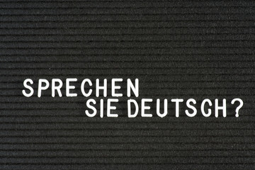 Eine Tafel mit der Frage Sprechen Sie Deutsch