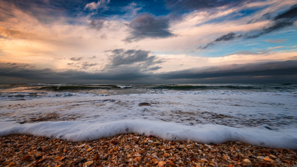 Seashore, stormy sea