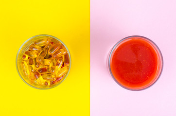 Concept of healthy lifestyle and diet. Fruits, vegetables, juices, pills and vitamin supplements