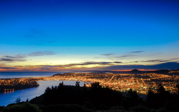 Evening night sunset view of Dunedin City, Otago, New Zealand South Island