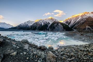 Fototapeta na wymiar An extremely beautiful landscape in New Zealand. There are glacier, ice, icebergs, rocks and snow mountains in this wilderness area. This place is great for tourist who like adventure and discovery.