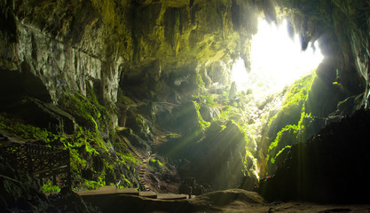 Cave shot of Borneo in Asia. Beautiful light ray. - obrazy, fototapety, plakaty