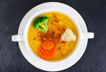Vegetable soup puree on  black background