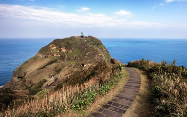 This is a breathtaking view of a hiking trail in Taiwan. The coastal walking path is dangerous and...