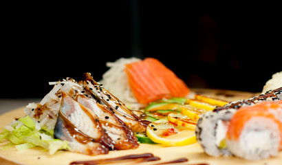 beautiful sushi, rolls, with caviar and fresh fish, close-up