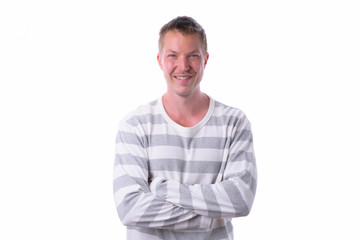 Young happy handsome man smiling isolated against white background