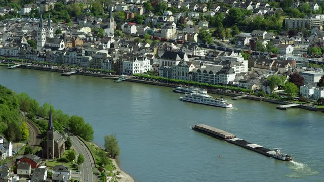 Cargo ships, famous popular Wine Village of Boppard at Rhine River, Rhine Valley is UNESCO World Heritage Site. middle Rhine Valley, Germany. BoppardJuly 2017