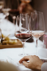 A glass of red rose and white wine