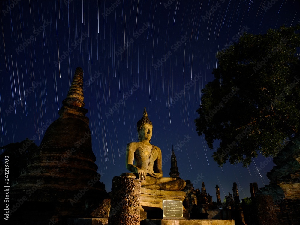 Wall mural star trail at temple