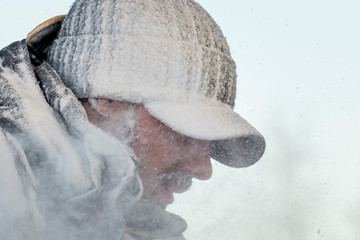 Portrait of a man covered with hoarfrost