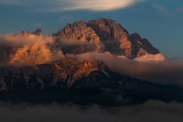 Mountain landscape with the riising sun