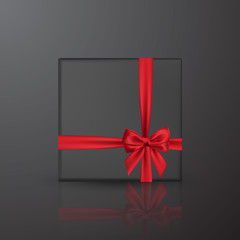 Realistic black gift box with red bow and ribbon. Element for decoration gifts, greetings, holidays. Vector illustration