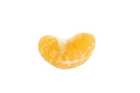 Isolated tangerines segments on white background close-up