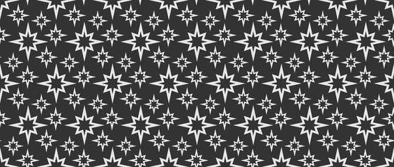 Stars on a Black Background Seamless Pattern