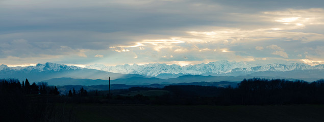 sunset panorama of pyrenees from aude, france