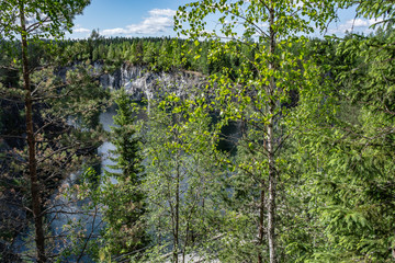 Artificial marble canyon filled with water