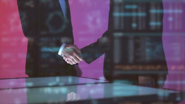 The two male handshake on the hologram background. slow motion