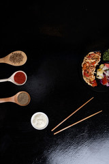 Fototapeta na wymiar spices and asian meal into black box