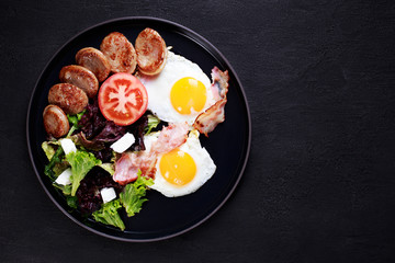 continental breakfast, countryside style meals, nourishing morning food. roasted eggs, sausage and salad