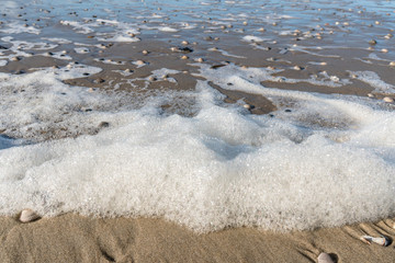 Sea and beach in the sunset.