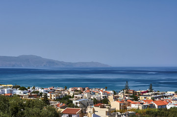Naklejka na ściany i meble buildings of a small town off the coast of Crete, Greece.