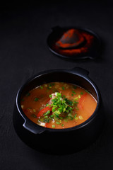 Hungarian goulash soup bograch, meat stew in a cast iron pot. meat restaurant, ethnic cuisine.