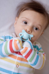 little baby with pacifier