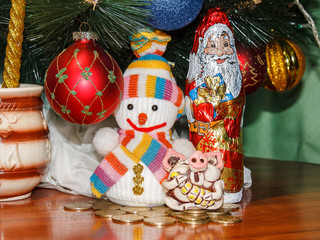 Christmas picture, greeting card with a pig, snowman and Santa Claus