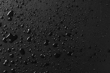Water droplets on black background - Image texture