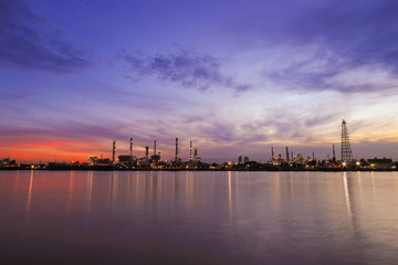  Bangchak Oil Refinery, a view of oil refinery along Chaopraya river at sunrise.