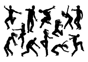 A set of men and women street dance hip hop dancers in silhouette