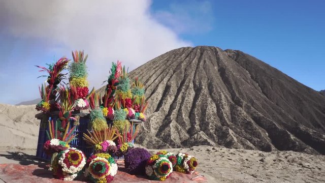 Cinemagraph of Religious Flowers for Sale at Smoking Active Volcano Batok in Indonesia