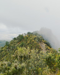 Fototapeta premium Hiking along the volcanic crater on Mount Longonot, Rift Valley, Kenya