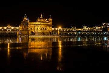 Fototapeta na wymiar A view of the Golden temple decorated for diwali festival in Amritsar