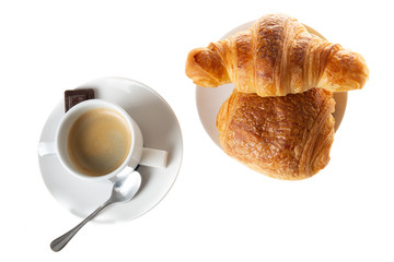 top flat view of a cup of coffee with croissant and chocolate pastry in France