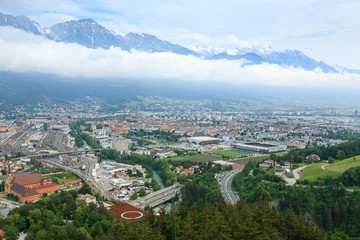 Fototapeta na wymiar Innsbruck aerial view with alps in background