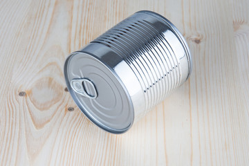 silver tin can on a wood background