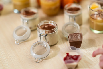 sweet and tasty deserts tiramisu, made out of coffee and mascarpone in a closeable glass