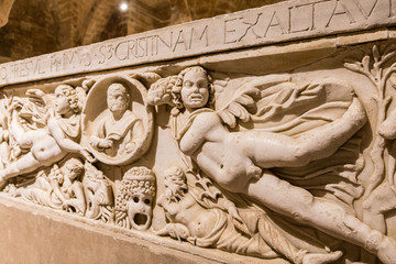 Reliefs from medieval tomb in chapel under cathedral in Palermo