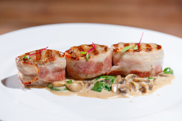Fried meat with mushroom sauce.