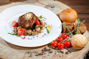 Meat dish with mushrooms.