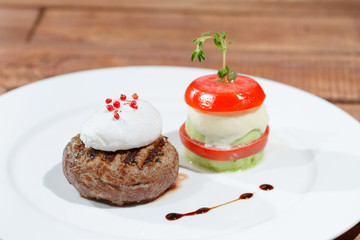 Dish with meat and eggs.