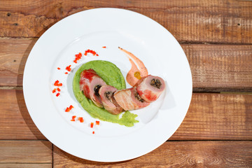 Pork tenderloin with broccoli puree.