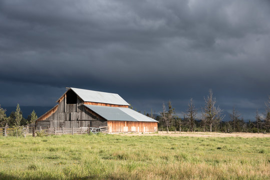 barn with ominous sky and clouds