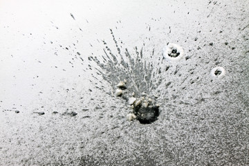 Radioactive texture in the ice surface