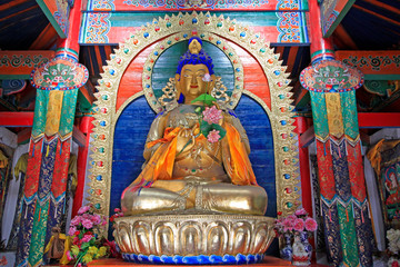 figure of Buddha and Prayer flag in the Five Pagoda Temple, Hohhot city, Inner Mongolia autonomous region, China
